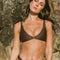 Girl wearing brown clip font bikini top and brown bikini bottoms