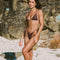 Girl wearing brown triangle ribbed bikini